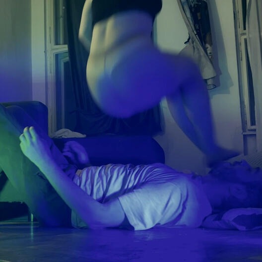 Full weight butt drop Girl doing a full-weight butt drop on a guy lying on a hard floor